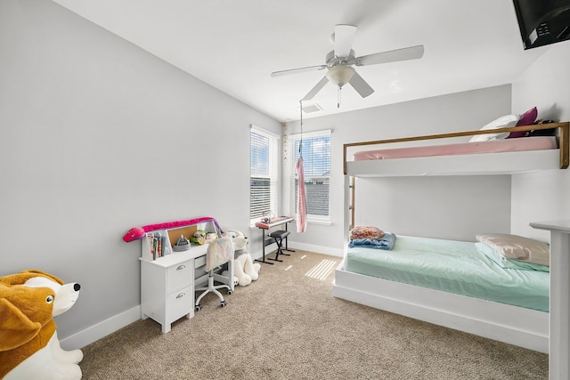 3204 Airport Rd, Panama City, FL 32405 - carpeted bedroom featuring baseboards and a ceiling fan