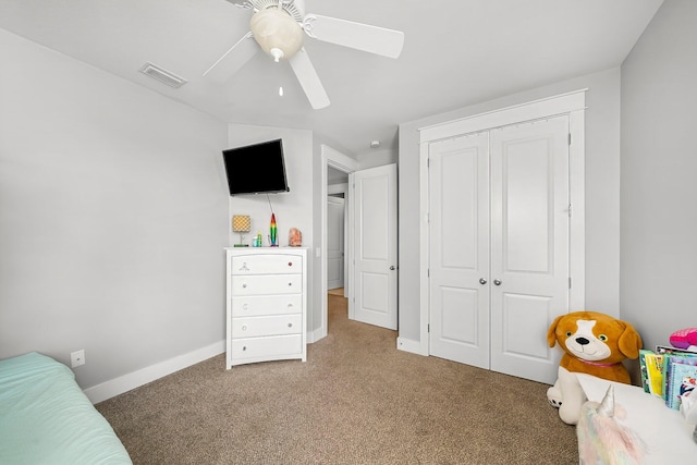 3204 Airport Rd, Panama City, FL 32405 - carpeted bedroom with a closet, baseboards, and ceiling fan