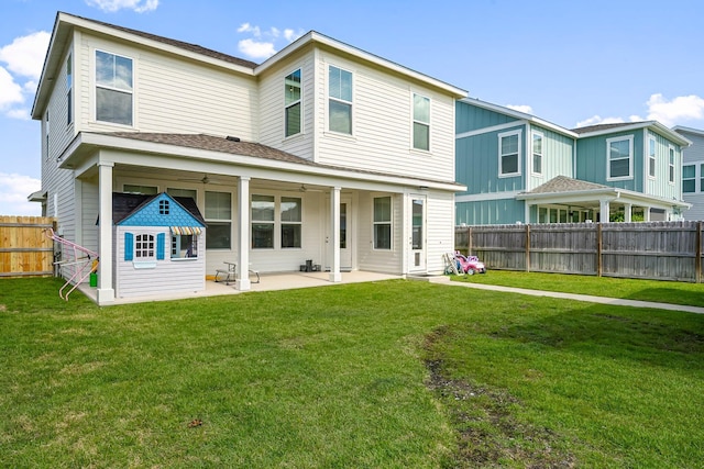 3204 Airport Rd, Panama City, FL 32405 - back of property featuring a patio area and roof with shingles