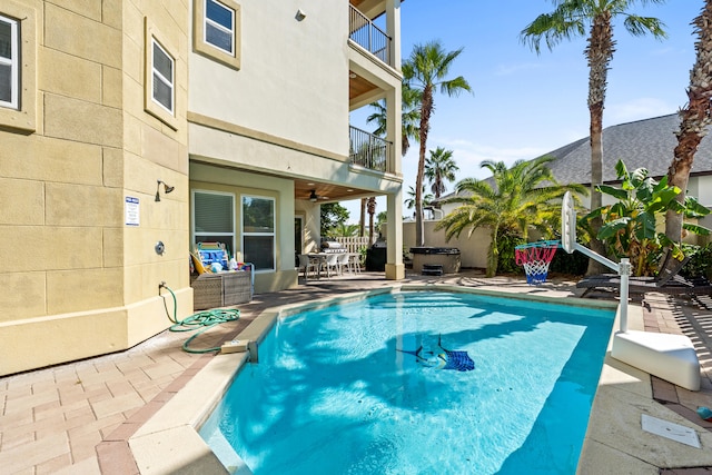 40 W Palm Beach Ct, Miramar Beach, FL 32550 - view of swimming pool with a hot tub and a patio