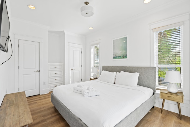 40 W Palm Beach Ct, Miramar Beach, FL 32550 - bedroom featuring crown molding, wood finished floors, and recessed lighting