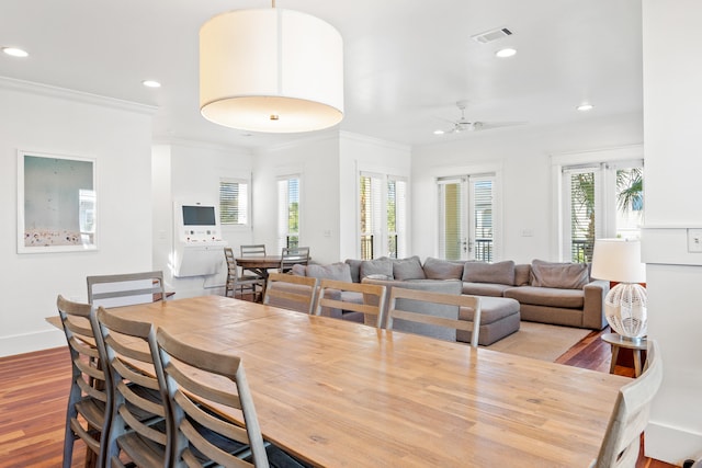 40 W Palm Beach Ct, Miramar Beach, FL 32550 - dining area featuring crown molding, recessed lighting, wood finished floors, plenty of natural light, and a ceiling fan