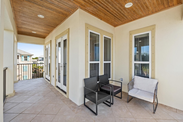 40 W Palm Beach Ct, Miramar Beach, FL 32550 - view of patio featuring french doors