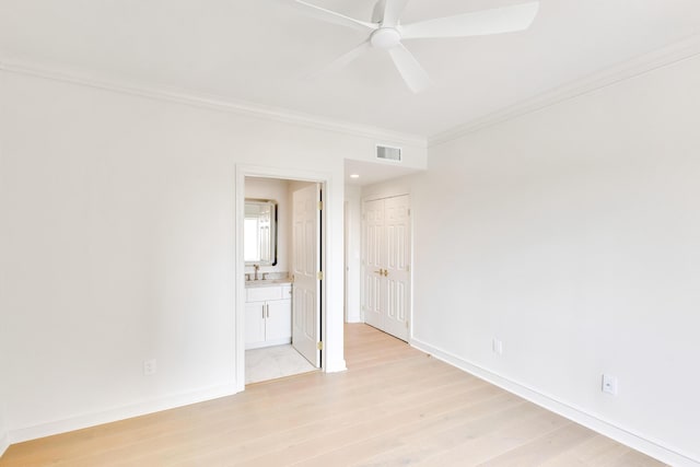 4629 Southwinds Dr Unit 4629, Miramar Beach, FL 32550 - unfurnished room with a ceiling fan, ornamental molding, light wood-style floors, baseboards, and a sink