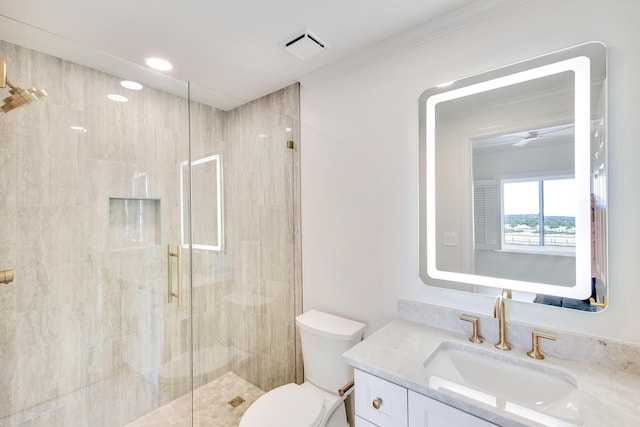 4629 Southwinds Dr Unit 4629, Miramar Beach, FL 32550 - full bath featuring a stall shower, vanity, toilet, ceiling fan, and ornamental molding
