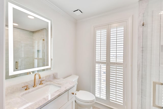 4629 Southwinds Dr Unit 4629, Miramar Beach, FL 32550 - bathroom featuring vanity, toilet, healthy amount of natural light, and crown molding