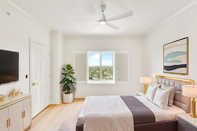 4629 Southwinds Dr Unit 4629, Miramar Beach, FL 32550 - bedroom with light wood-style flooring, crown molding, a ceiling fan, and baseboards