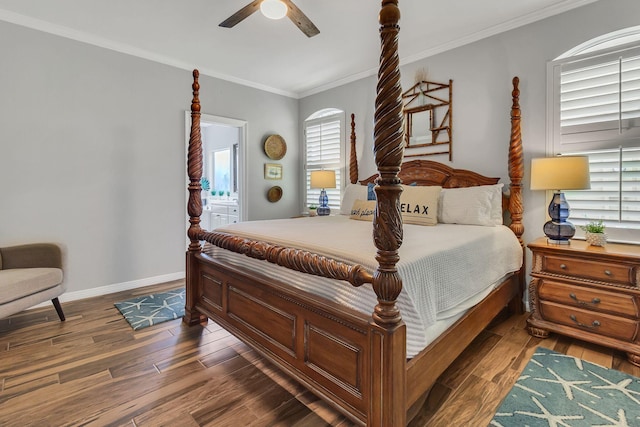 35 Opal Cv, Miramar Beach, FL 32550 - bedroom featuring wood finished floors, crown molding, baseboards, ceiling fan, and ensuite bathroom