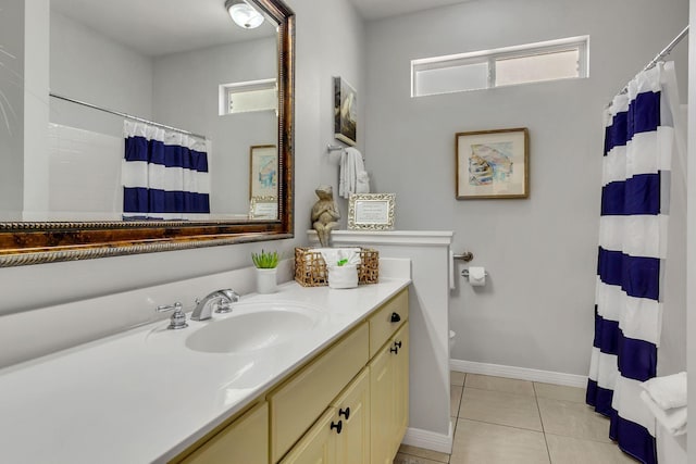35 Opal Cv, Miramar Beach, FL 32550 - full bath with tile patterned floors, toilet, vanity, curtained shower, and baseboards