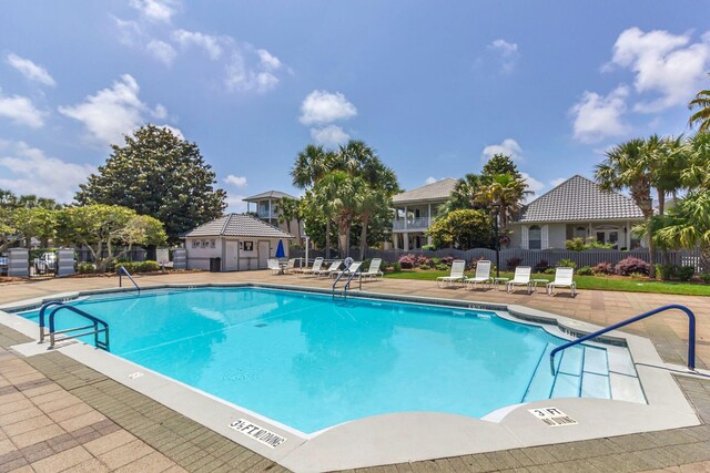 35 Opal Cv, Miramar Beach, FL 32550 - community pool with a patio area