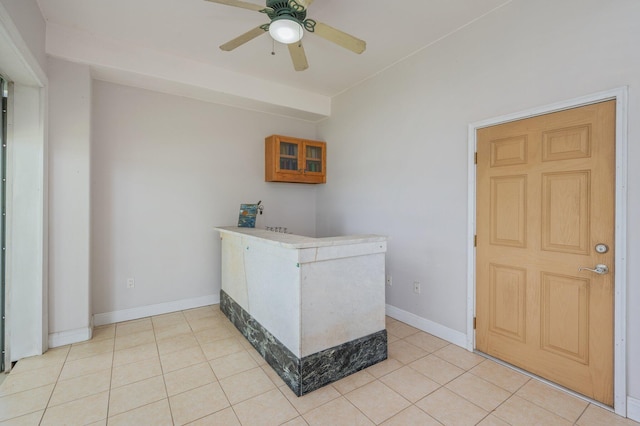 1405 N Bayshore Dr, Niceville, FL 32578 - bar featuring ceiling fan, light tile patterned floors, and baseboards