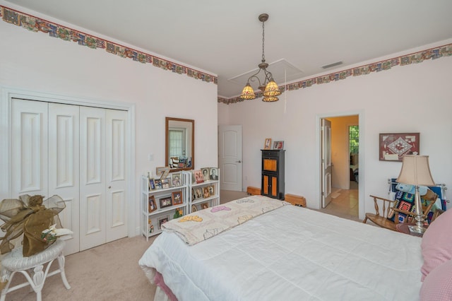 1405 N Bayshore Dr, Niceville, FL 32578 - bedroom featuring light colored carpet, attic access, and a closet