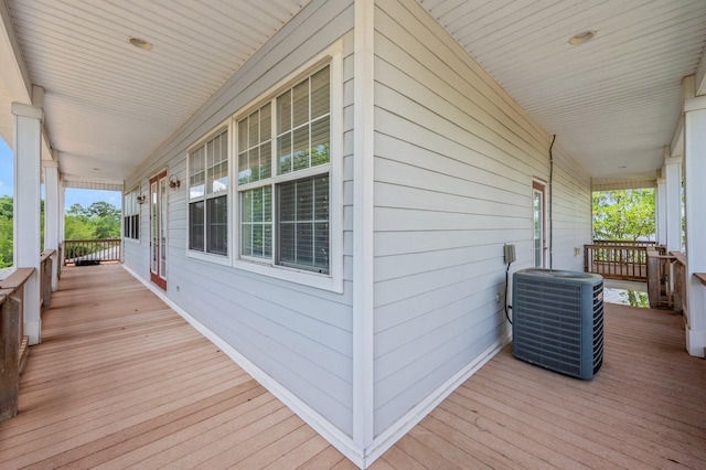 1405 N Bayshore Dr, Niceville, FL 32578 - porch featuring central air condition unit
