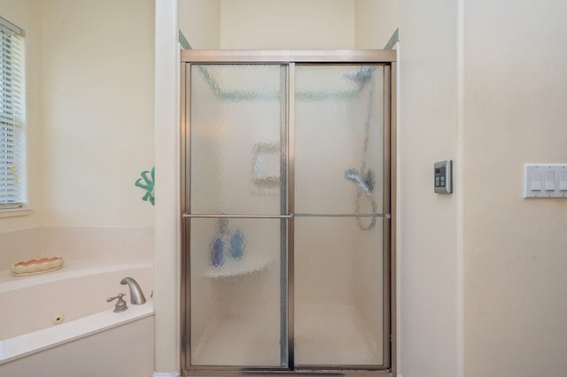 1405 N Bayshore Dr, Niceville, FL 32578 - bathroom featuring a stall shower and a jetted tub