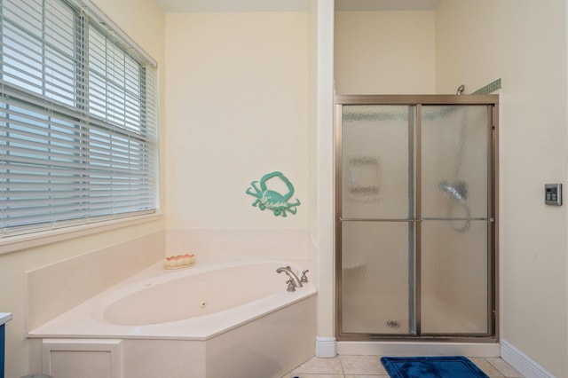 1405 N Bayshore Dr, Niceville, FL 32578 - bathroom with a shower stall, a garden tub, tile patterned flooring, and baseboards