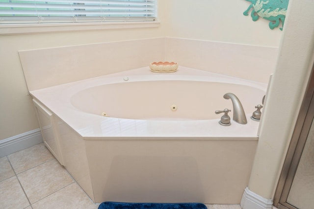 1405 N Bayshore Dr, Niceville, FL 32578 - bathroom featuring a tub with jets and tile patterned floors