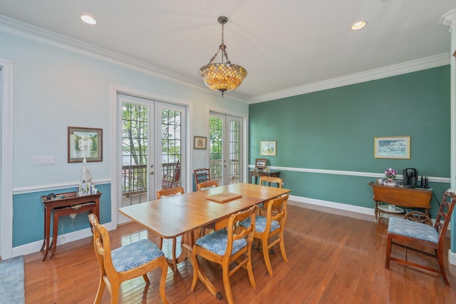 1405 N Bayshore Dr, Niceville, FL 32578 - dining room with wood finished floors, french doors, crown molding, baseboards, and recessed lighting