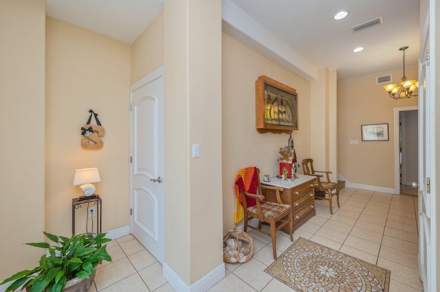 1405 N Bayshore Dr, Niceville, FL 32578 - hallway featuring light tile patterned flooring, a chandelier, recessed lighting, and baseboards