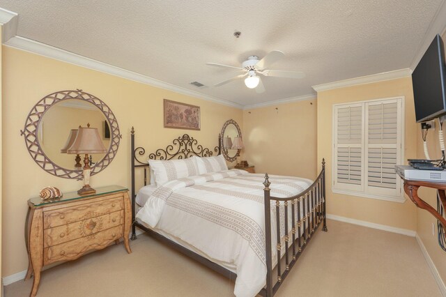 144 Spires Ln Unit 403, Santa Rosa Beach, FL 32459 - bedroom with carpet, ornamental molding, a textured ceiling, baseboards, and a ceiling fan