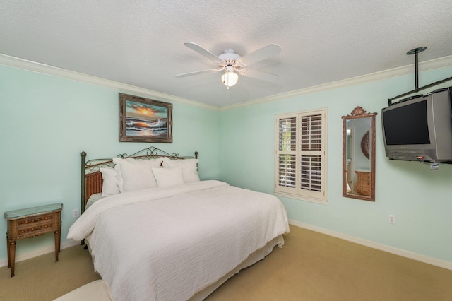 144 Spires Ln Unit 403, Santa Rosa Beach, FL 32459 - carpeted bedroom with ornamental molding, baseboards, ceiling fan, and a textured ceiling
