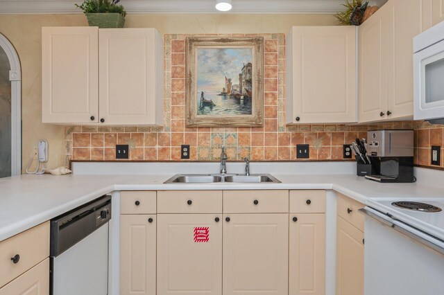 144 Spires Ln Unit 403, Santa Rosa Beach, FL 32459 - kitchen featuring white appliances, a sink, tasteful backsplash, light countertops, and white cabinetry