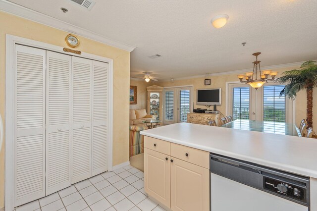 144 Spires Ln Unit 403, Santa Rosa Beach, FL 32459 - kitchen featuring white dishwasher, open floor plan, ornamental molding, light tile patterned flooring, and light countertops