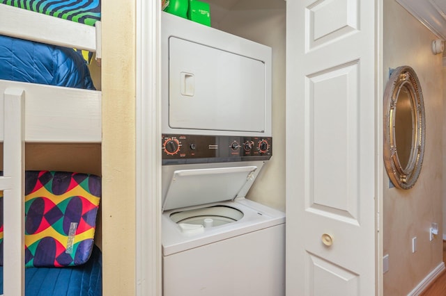144 Spires Ln Unit 403, Santa Rosa Beach, FL 32459 - laundry area featuring stacked washer / dryer