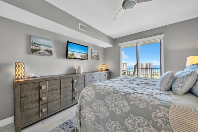 122 Seascape Dr Unit 1104, Miramar Beach, FL 32550 - bedroom with access to exterior, baseboards, and ceiling fan