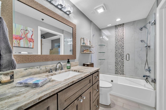 122 Seascape Dr Unit 1104, Miramar Beach, FL 32550 - full bathroom with toilet, vanity, recessed lighting, bath / shower combo with glass door, and wood finished floors