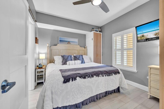 122 Seascape Dr Unit 1104, Miramar Beach, FL 32550 - bedroom with ceiling fan and baseboards