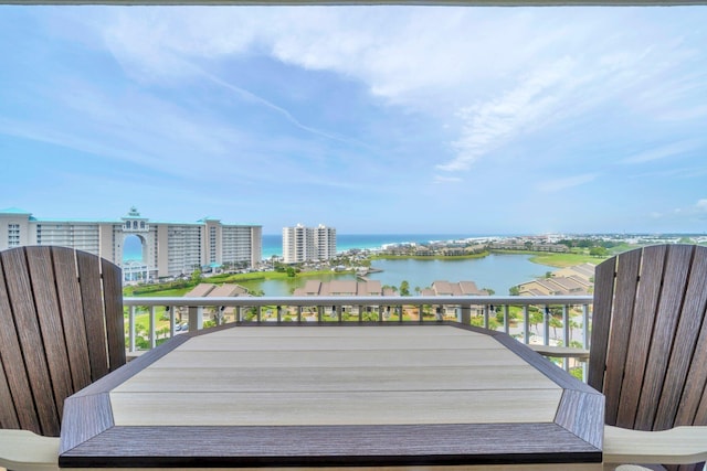122 Seascape Dr Unit 1104, Miramar Beach, FL 32550 - wooden terrace with a water view