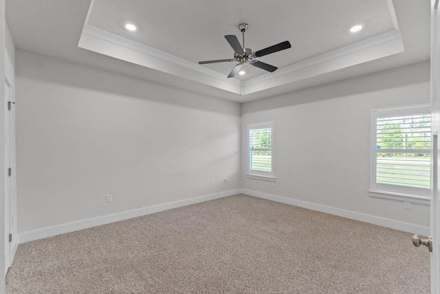 608 Champ Trl, Crestview, FL 32539 - empty room featuring a raised ceiling, carpet floors, baseboards, recessed lighting, and ornamental molding