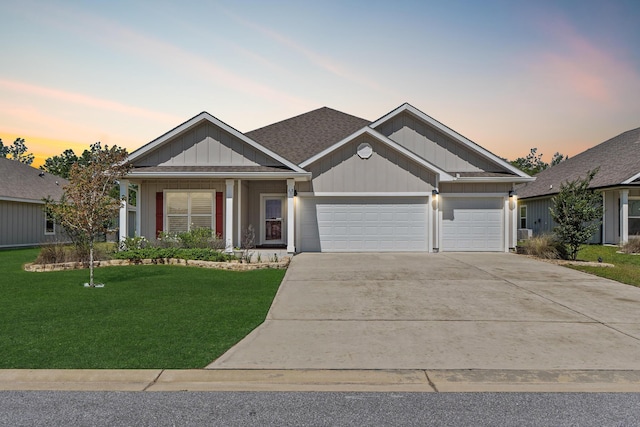 608 Champ Trl, Crestview, FL 32539 - ranch-style house featuring a garage, a front yard, driveway, and board and batten siding