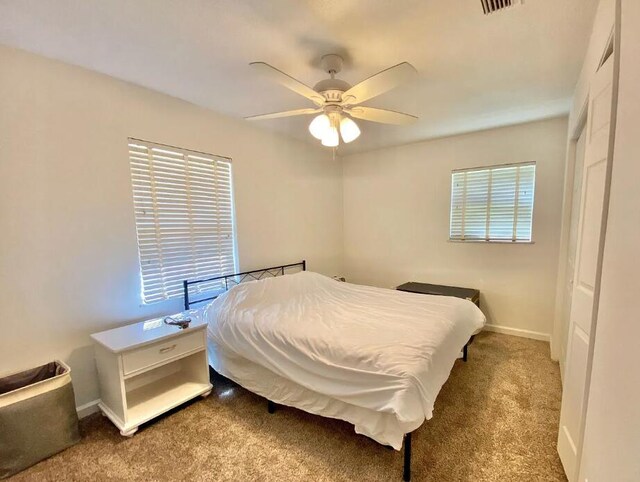 123 NW Sotir St, Fort Walton Beach, FL 32548 - bedroom featuring carpet floors, baseboards, and a ceiling fan