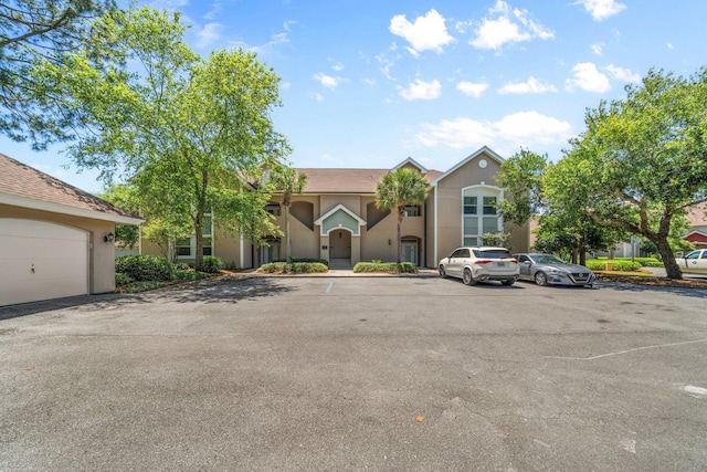 8512 Turnberry Ct Unit 8512, Miramar Beach, FL 32550 - view of front of property with uncovered parking and stucco siding