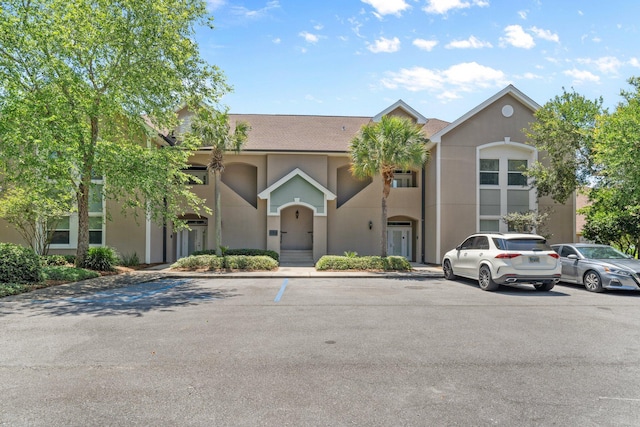 8512 Turnberry Ct Unit 8512, Miramar Beach, FL 32550 - view of building exterior with uncovered parking