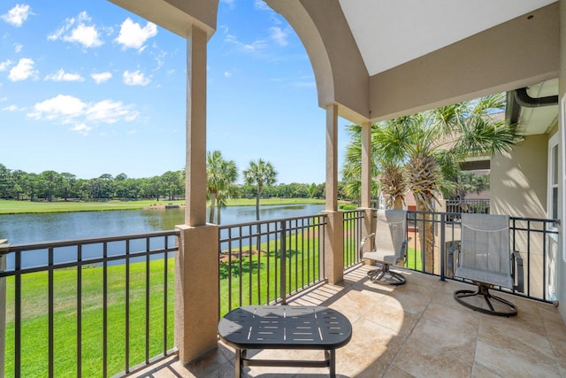8512 Turnberry Ct Unit 8512, Miramar Beach, FL 32550 - view of patio featuring a water view, a balcony, and view of wooded area