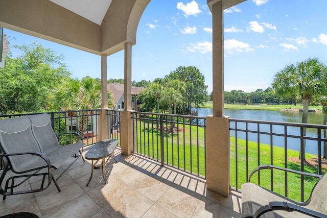 8512 Turnberry Ct Unit 8512, Miramar Beach, FL 32550 - balcony with a water view and view of wooded area