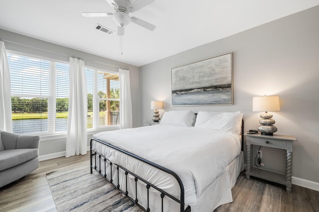 8512 Turnberry Ct Unit 8512, Miramar Beach, FL 32550 - bedroom with baseboards, wood finished floors, and ceiling fan