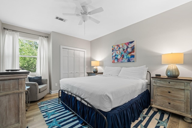 8512 Turnberry Ct Unit 8512, Miramar Beach, FL 32550 - bedroom featuring light wood finished floors, a closet, baseboards, and ceiling fan