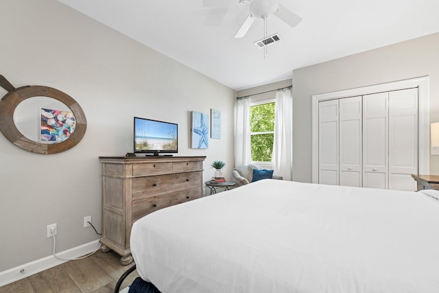 8512 Turnberry Ct Unit 8512, Miramar Beach, FL 32550 - bedroom featuring light wood finished floors, baseboards, a closet, and a ceiling fan
