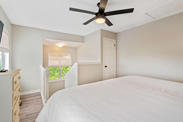 4508 Luke Ave, Destin, FL 32541 - bedroom with light wood-style floors, baseboards, and ceiling fan