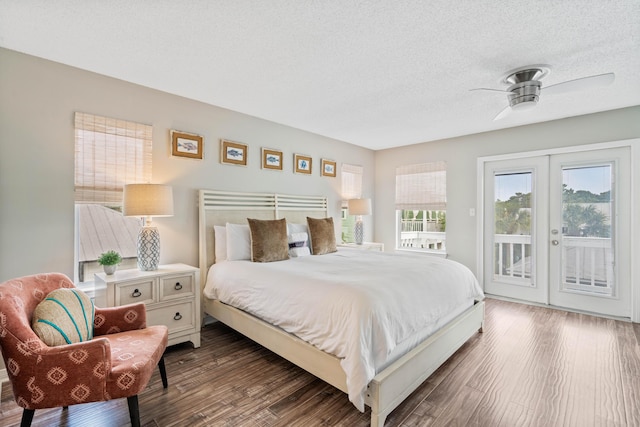4508 Luke Ave, Destin, FL 32541 - bedroom with access to outside, french doors, wood finished floors, and a textured ceiling