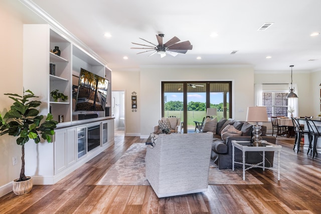 1725 Vinson Ray Rd, Baker, FL 32531 - living room with a ceiling fan, wood finished floors, recessed lighting, baseboards, and crown molding