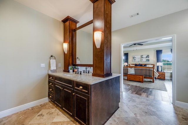 1725 Vinson Ray Rd, Baker, FL 32531 - bathroom with baseboards, vanity, and ceiling fan