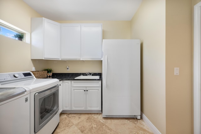 1725 Vinson Ray Rd, Baker, FL 32531 - laundry room with washing machine and clothes dryer, cabinet space, and baseboards