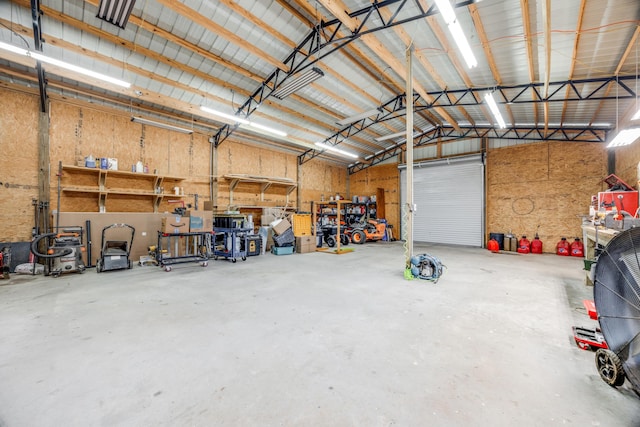 1725 Vinson Ray Rd, Baker, FL 32531 - garage with a workshop area and metal wall