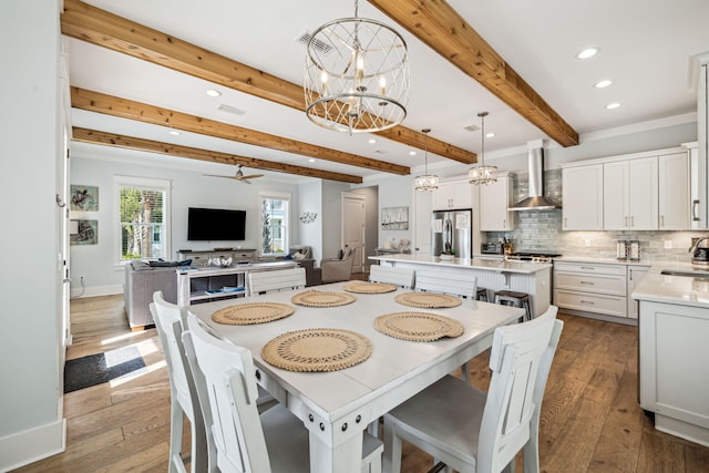 60 Barefoot Ln, Inlet Beach, FL 32461 - dining area featuring dark wood-style floors, beam ceiling, recessed lighting, a chandelier, and baseboards