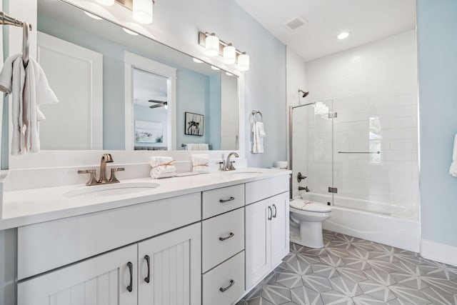 60 Barefoot Ln, Inlet Beach, FL 32461 - bathroom with double vanity, toilet, washtub / shower combination, and recessed lighting