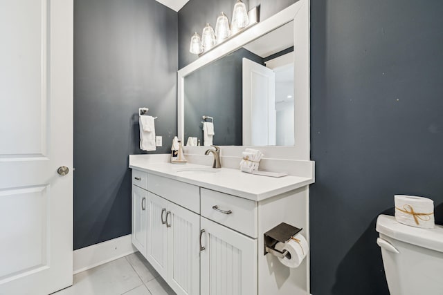 60 Barefoot Ln, Inlet Beach, FL 32461 - half bath with toilet, vanity, baseboards, and tile patterned floors